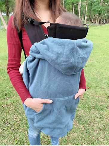 IBQ保暖罩有收納口袋設計，把自己的手放進去也覺得暖暖的